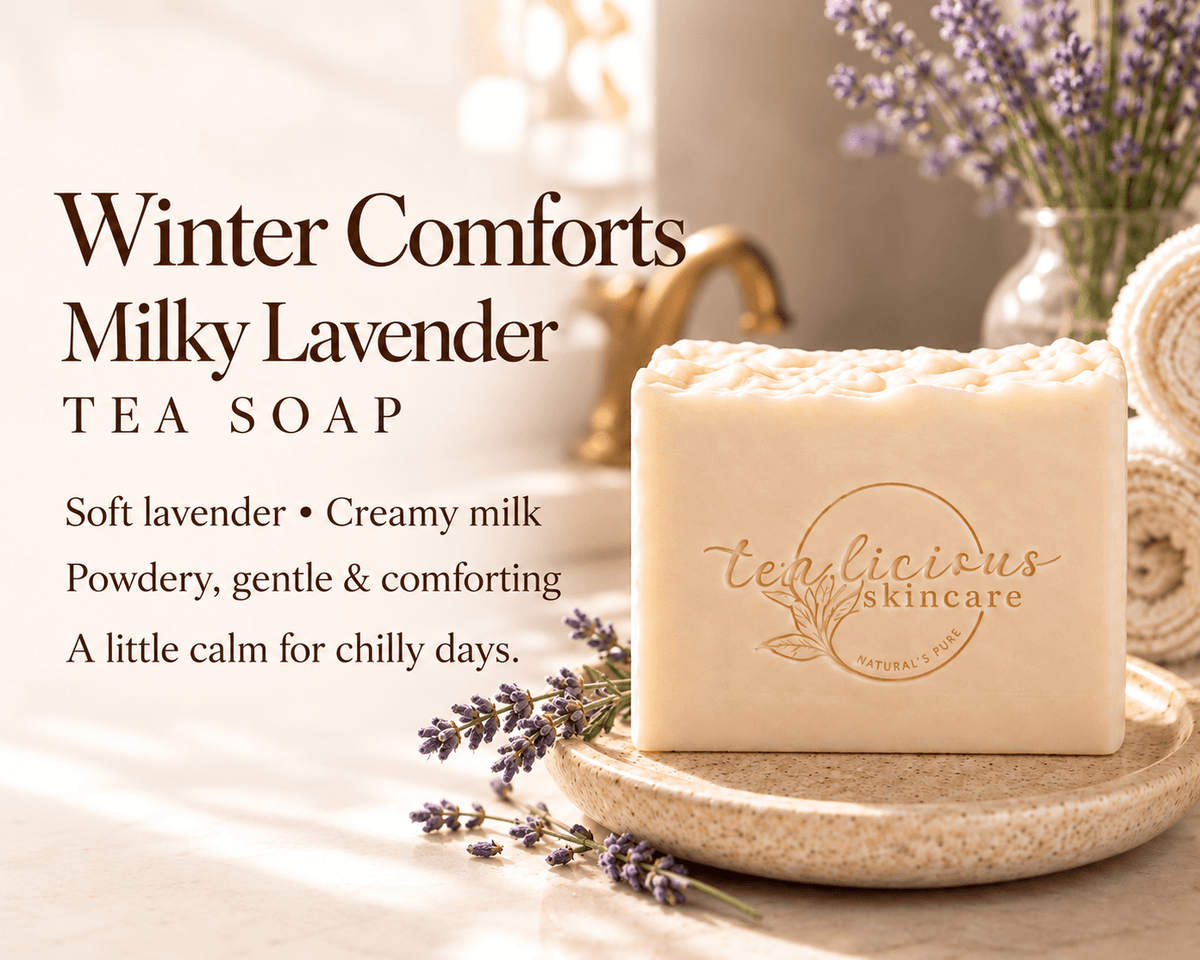 Tea-licious Milky Lavender Tea Soap on a stone dish beside lavender sprigs. Winter Comforts: soft lavender and creamy milk; powdery, gentle and comforting. A little calm for chilly days.