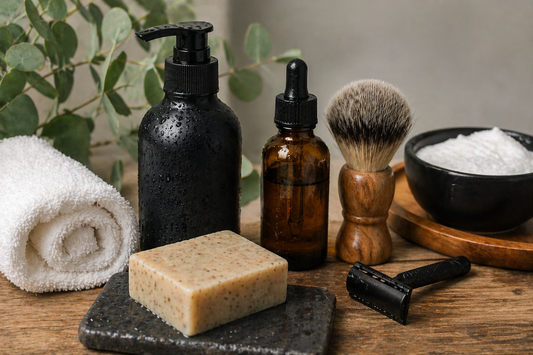 Shaving routine setup with soap razor brush and oil showing balanced skin prep to reduce irritation