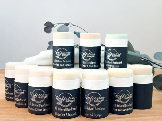 Tea-Licious Skincare natural deodorant collection featuring multiple aluminum-free deodorant sticks with botanical ingredients.