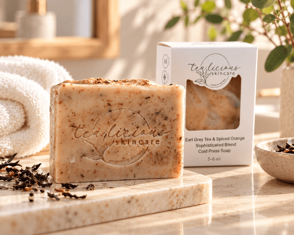 Mulled Orange Cider Tea Soap Bar Soap cold process soap displayed beside its box on a luxury marble bathroom sink.