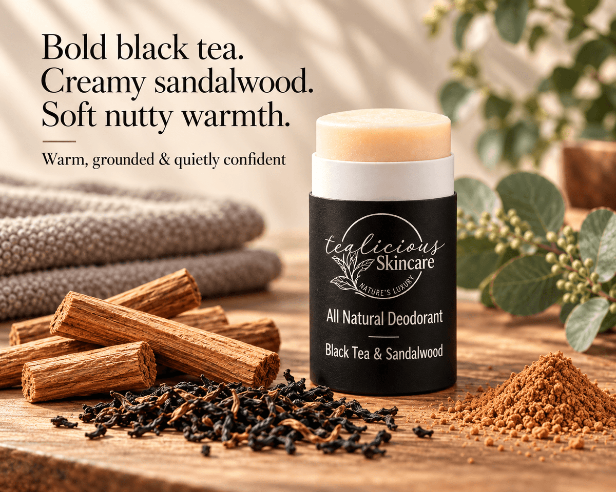 Tea-licious Black Tea & Sandalwood Deodorant beside tea leaves and sandalwood, with text describing bold black tea, creamy sandalwood and soft nutty warmth.
