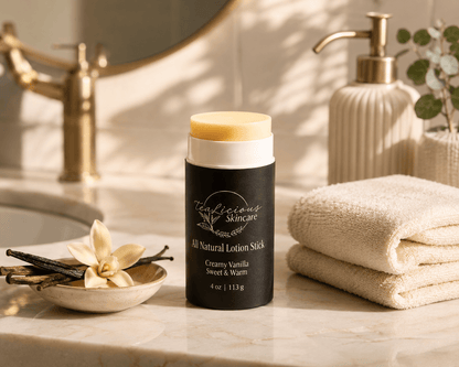 Creamy Vanilla lotion stick displayed on a warm, sunlit bathroom counter with folded towels