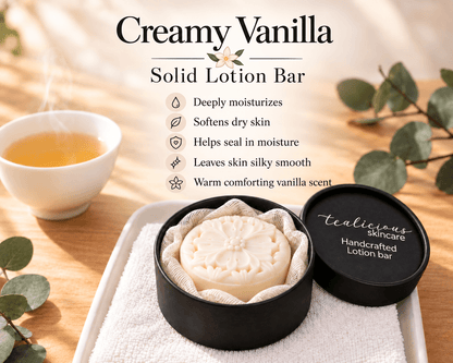 Creamy Vanilla Solid Lotion Bar in black Tea-Licious Skincare packaging with five benefits: deep moisture, softer dry skin, moisture retention, a silky smooth finish, and a warm comforting vanilla scent.
