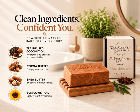 Tea-licious Cashmere & Cocoa Butter Soap on a bamboo rack beside its box, with tea-infused coconut oil, cocoa butter, shea butter and sunflower oil highlighted.