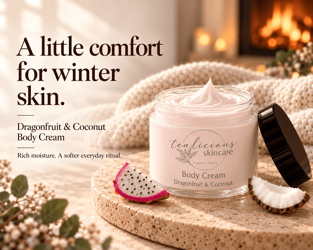 Tea-licious Dragonfruit & Coconut Body Cream beside a knit blanket and glowing fireplace, with the message “A little comfort for winter skin.”