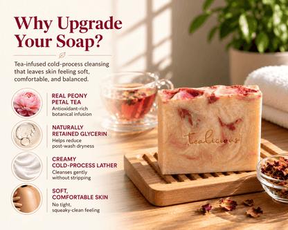 Tea-licious cream and pink peony petal tea soap on a bamboo rack, with text highlighting tea infusion, retained glycerin, creamy lather and soft, comfortable ski
