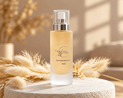 Tea-licious African Kigelia Hydrating Mist with soft botanicals in warm luxury skincare setting