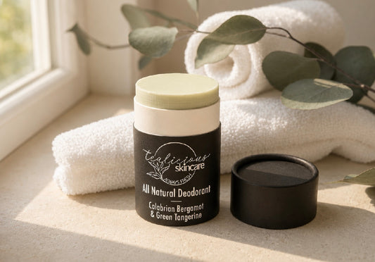 Tea-licious Skincare Calabrian Bergamot & Green Tangerine baking soda free deodorant in a minimalist setting with warm morning light.