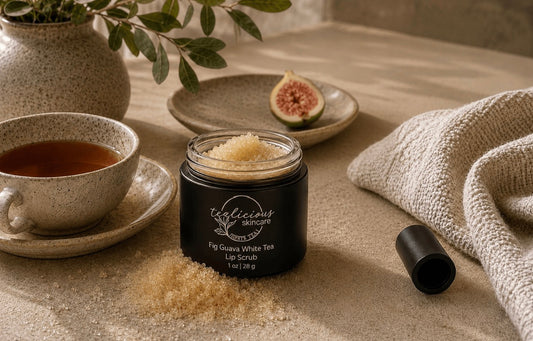 Tea-licious Fig Guava White Tea lip scrub with sugar texture in warm spa setting with soft light