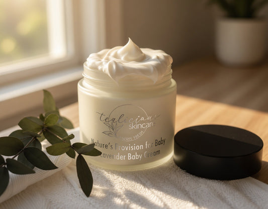 Jar of baby cream with a plant on a wooden surface