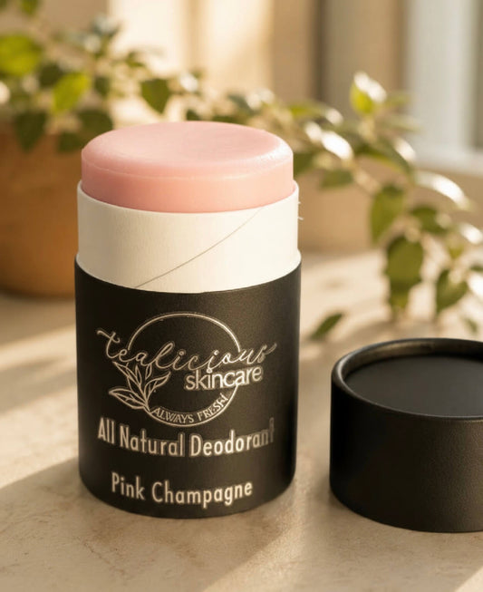 Tea-licious Skincare Pink Champagne baking soda free deodorant in a minimalist, warm morning light setting.