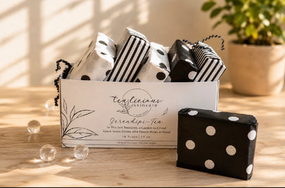 Serendipi-Tea gift set with wrapped soaps in elegant box displayed in warm natural morning light.