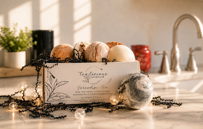 Tea guest soaps gift set displayed on bathroom counter in warm natural morning light.