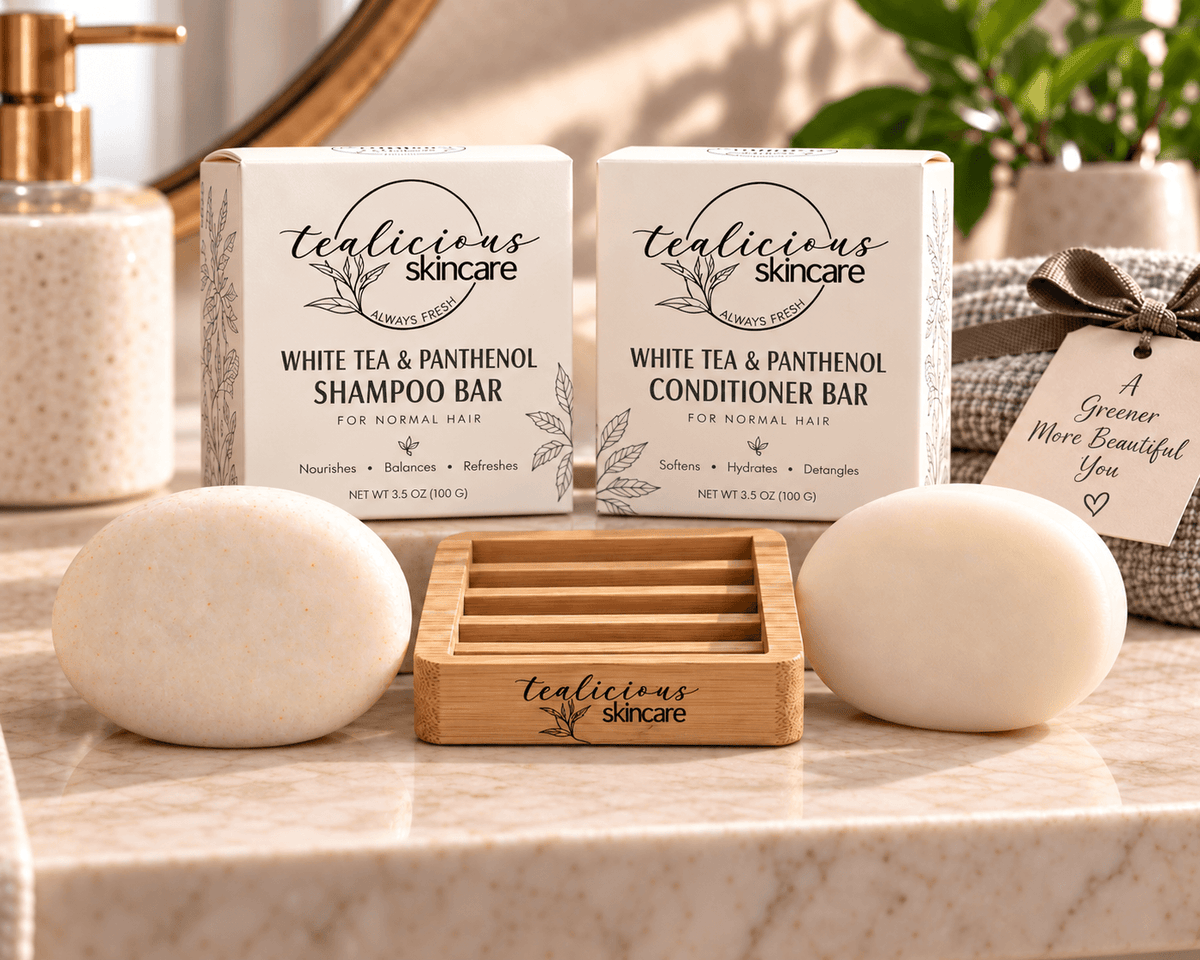 ea-Licious White Tea & Panthenol Shampoo and Conditioner Bars for normal hair, displayed with matching solid bars and a bamboo soap dish.
