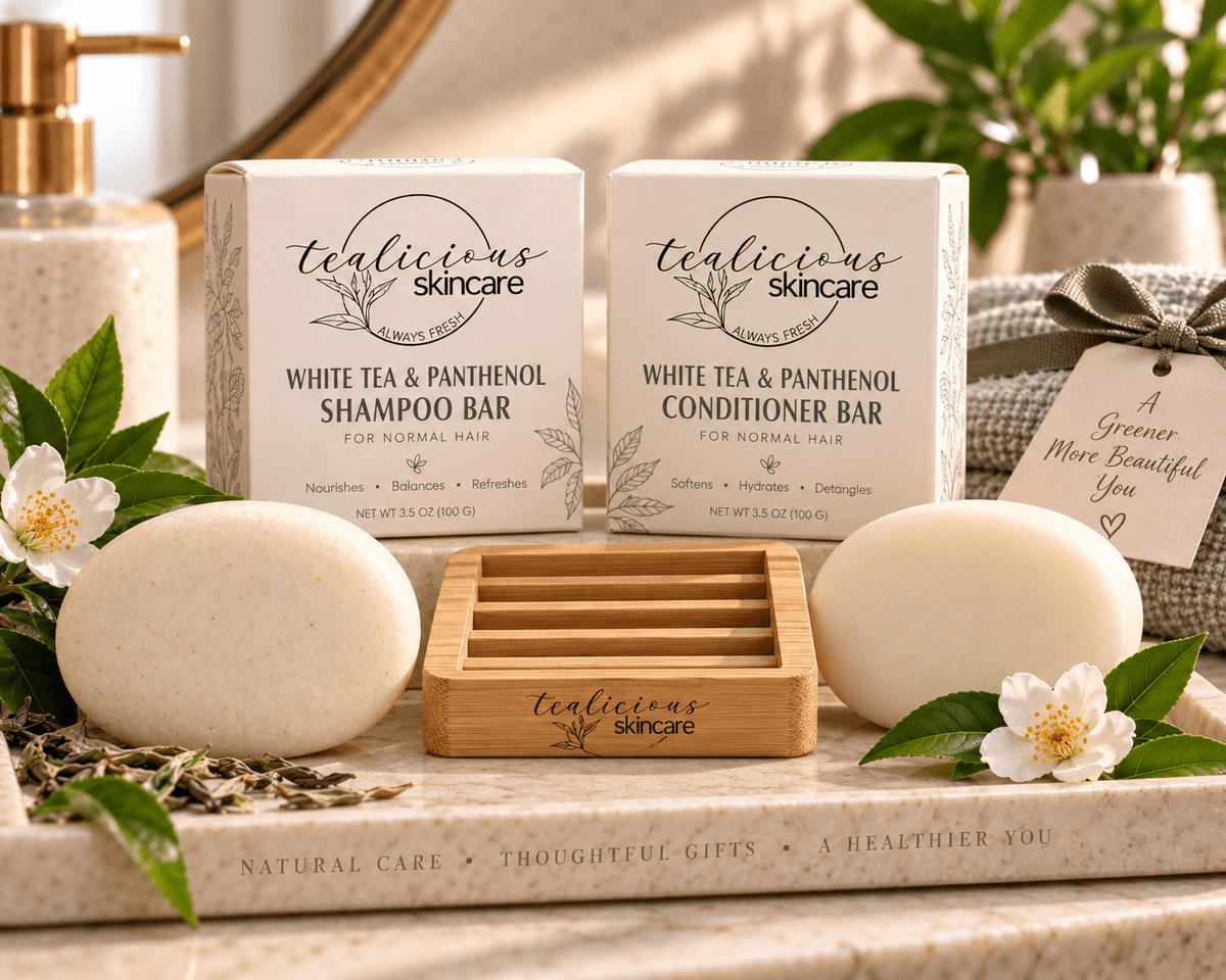 Tea-Licious White Tea & Panthenol shampoo and conditioner bars presented as a gift set with bamboo drying rack.